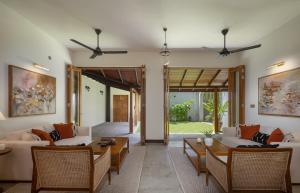 a living room with couches and a table at Granny's House in Colombo