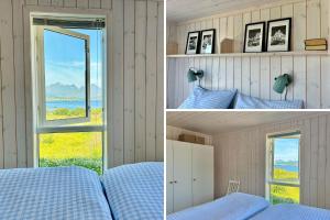 a bedroom with a bed and a window with a view at Sea Pearl Lodge in Leknes