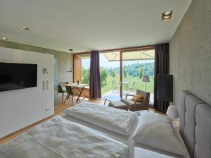Postel nebo postele na pokoji v ubytování An der Lage - Das Hideaway