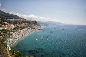 an aerial view of a beach with boats in the water at Casa Le Marinelle Amalfi Coast in Vietri sul Mare