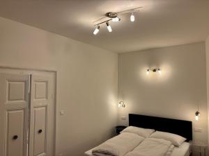 Ліжко або ліжка в номері Carlton Suites