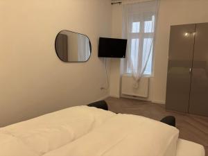 Телевізор і / або розважальний центр в Carlton Suites