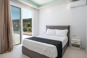 Giường trong phòng chung tại Villa Katerina Kateleios 2 +33 ảnh