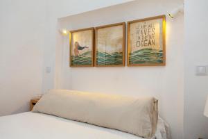 En eller flere senge i et værelse på Caracol Corner Studio in Lagos