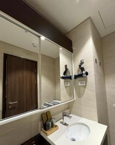 Ένα μπάνιο στο Tambuli Seaside Living Condominium -Private Host Tower D