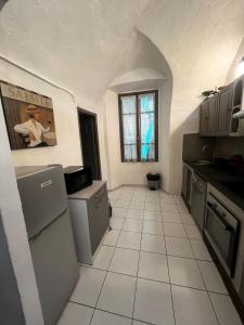 Η κουζίνα ή μικρή κουζίνα στο Joli T3 dans le centre de Bastia