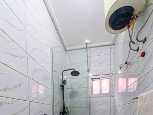 Ένα μπάνιο στο Chambre Senior - RESIDENCE BAHO - Douala Makepe BM