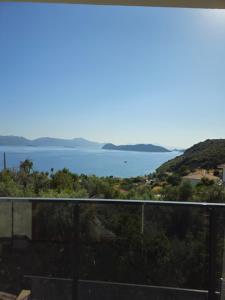 a view of the ocean from the balcony of a house at Asiyan Villas in Marmaris