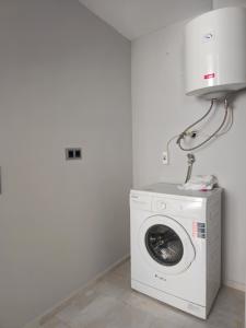 a washing machine in a room with a lamp at Asiyan Villas in Marmaris +25 photos