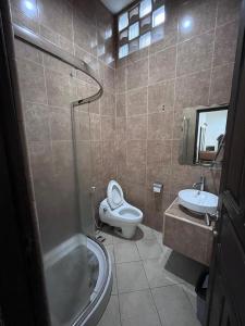 Koupelna v ubytování Hotel O Bungalow Homestay