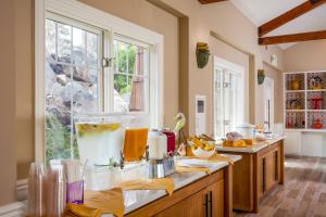a kitchen with a counter with a blender on it at Lighthouse Lodge & Cottages in Pacific Grove