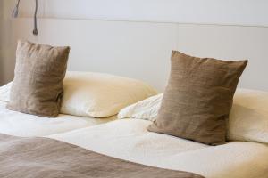 Postel nebo postele na pokoji v ubytování Hôtel Elite