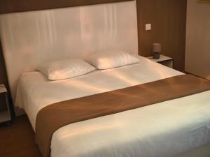 Letto o letti in una camera di Domaine du Parc Waechter