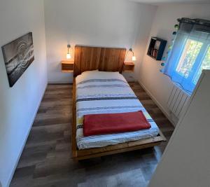 Ένα ή περισσότερα κρεβάτια σε δωμάτιο στο Océan House Le Porge