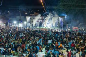 a large crowd of people standing in front of a stage at Konayethu BnB in Mdantsane