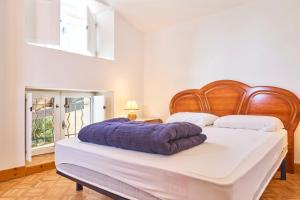 Giường trong phòng chung tại Maison de campagne pour 8 personnes +19 ảnh