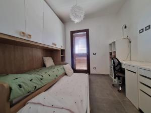Ένα ή περισσότερα κρεβάτια σε δωμάτιο στο Domeddas - Domedda David