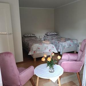 Postel nebo postele na pokoji v ubytování Apartamenty 40