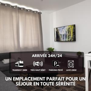 an image of a living room with a tv at Le 3 Chambres Parking Proche Tram in Clermont-Ferrand