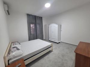 Ένα ή περισσότερα κρεβάτια σε δωμάτιο στο Case Vacanze Gallucci al Mare