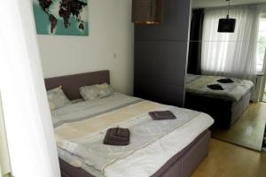 Giường trong phòng chung tại Reihenhaus zum ausruhen