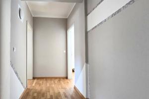 Фотография из галереи L21-Apartment Ottendorf-Okrilla, 1 Zimmer, 3 Betten, Standardisierte Ausstattung, ideal für Reisende, Pendler, Familien в городе Ottendorf-Okrilla