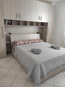 Postel nebo postele na pokoji v ubytování Soggiorno Esclusivo in Villa con Giardino