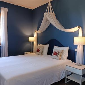 Una cama o camas en una habitación de Villa Fonti 15 fotos más
