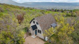 an overhead view of a white barn in a field at Cozy Mtn Cabin - Epic Views - Hot Tub - Fire Pit in Midway
