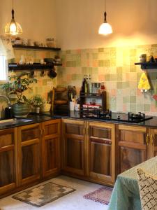 Η κουζίνα ή μικρή κουζίνα στο Anh bán gấu - Jellycat & Homestay +43 φωτογραφίες