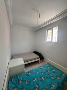 Ένα ή περισσότερα κρεβάτια σε δωμάτιο στο Studio El Medina Mahdia