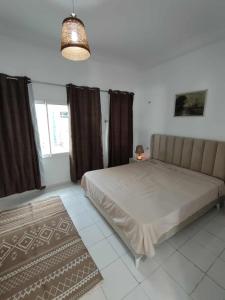 Postel nebo postele na pokoji v ubytování La Marsa charming house Marsa + 15 fotografií