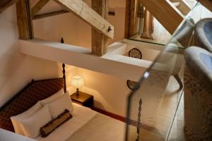 an overhead view of a room with a bed at Sir Prague, part of Sircle Collection in Prague