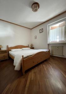 Ένα ή περισσότερα κρεβάτια σε δωμάτιο στο Casa Canazei, 2-5 pers Appartement 122