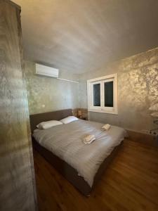 Postel nebo postele na pokoji v ubytování Villa Mala Luce