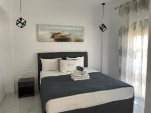 Postel nebo postele na pokoji v ubytování SeaView Peramos 1 + 25 fotografií