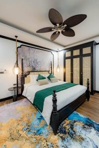 Кровать или кровати в номере Cozy An Luangprabang Hotel