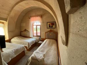 Ένα ή περισσότερα κρεβάτια σε δωμάτιο στο Hotel Kral Boutique