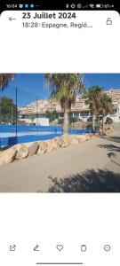a screenshot of a picture of a street with a building at location appartement isla plana espagne in Isla Plana