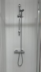 a metal towel rack on a white wall at Entire Peaceful in Central London in London