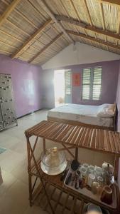 Voodi või voodid majutusasutuse Bungalow au cœur de la nature toas