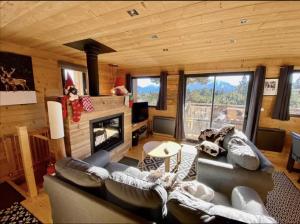 Posezení v ubytování Chalets des Esquits vue panoramique pistes proches à pied