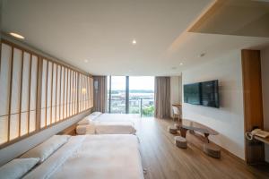 Ένα ή περισσότερα κρεβάτια σε δωμάτιο στο Lake In Mountain