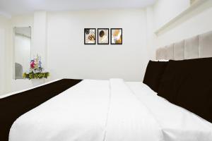 Foto Mumbais asuva majutusasutuse Hotel O Devanshi Nx galeriist