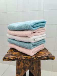 a pile of towels sitting on top of a table at Auravignon in Sorgues
