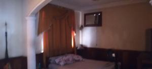 a bedroom with a bed and a window in a room at Cop 30 in Belém +11 photos