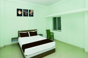 Katil atau katil-katil dalam bilik di Hotel O Royal Residency