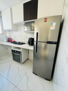 Kuchyň nebo kuchyňský kout v ubytování Apto 201 bloco 02 · Apto Moderno em frente à Arena MRV / Expominas + 8 fotografií