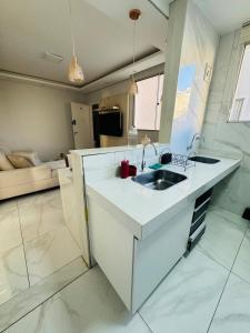 Kuchyň nebo kuchyňský kout v ubytování Apto 201 bloco 02 · Apto Moderno em frente à Arena MRV / Expominas