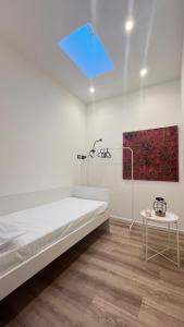 Postel nebo postele na pokoji v ubytování Oasis by ZiiRA